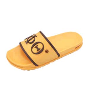 A pair of yellow sandals with the word " yolo " written on them.